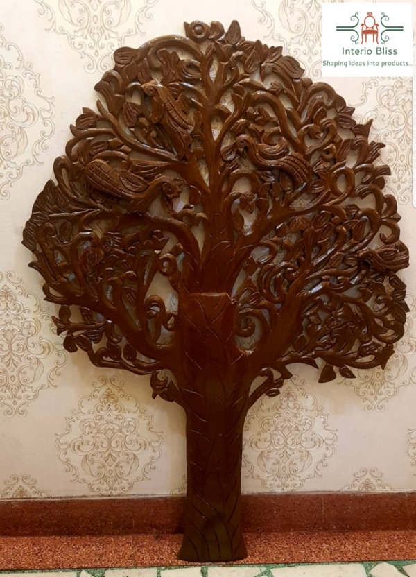 Wooden tree as wall art beautifully carved by skillful artisans . Dimensions- Height- 5 feet Width- 3.5 feet Finish- Oak wood finish with lacer coating to make it maintenance free. Team Interio Bliss +91-8859485555 ; +91-8859495555 www.interiobliss.com