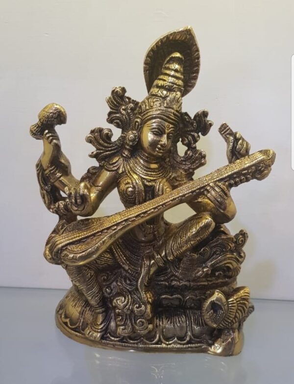 Brass statue saraswati mata ji, beautifully hand carved by skilled artisans. Dimensions- Height- 11" Weight- 5.300 kg Material- Brass, Finish- Brass antique finish. Team Interio Bliss +91-8859485555 ; +91-8859495555 www.interiobliss.com